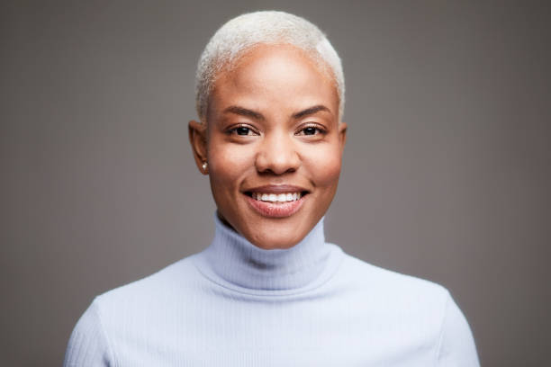 istock Studio headshot of a businesswoman wearing a light blue pullover.. 1181860698