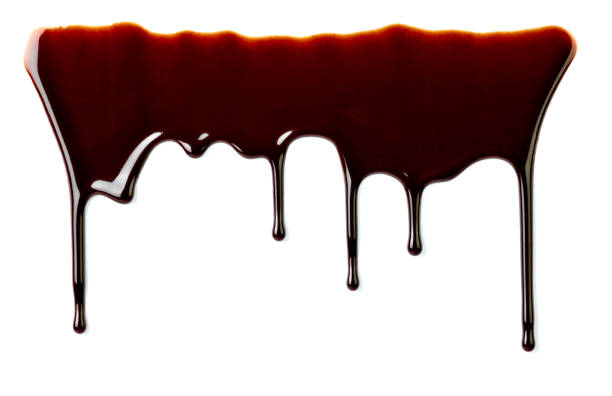 istock chocolate syrup dessert food sweet leaking drop 1181865876