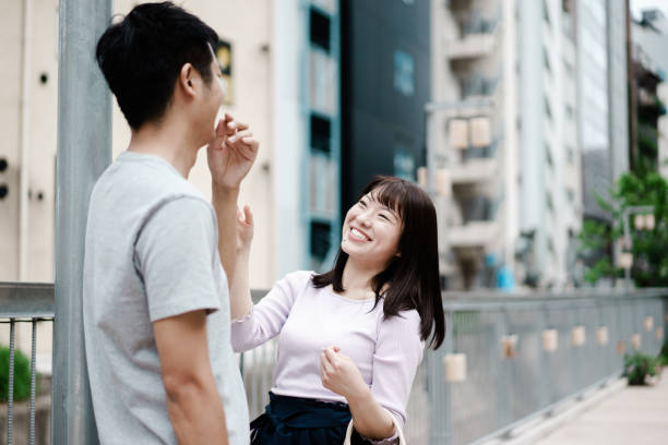 istock Young Asian couple enjoying a date 1181867101
