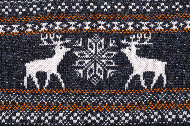 istock Knitted elks and snowflake traditional cristmas ornament 1181867197