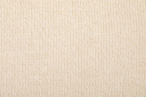 istock Beige melange knitting fabric textured background 1181867304