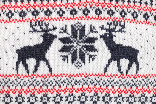 istock Knitted elks and snowflake traditional cristmas ornament 1181867433