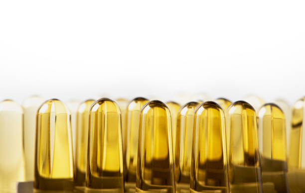 istock Many brown glass ampoules stand in a row 1181867575