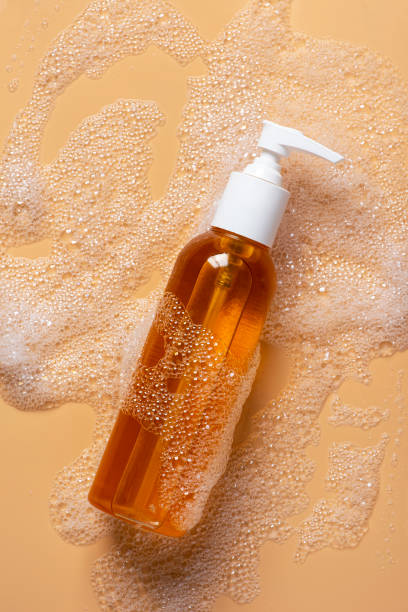 istock Hydrophilic cleansing oil and foam on a soft beige background 1181867709