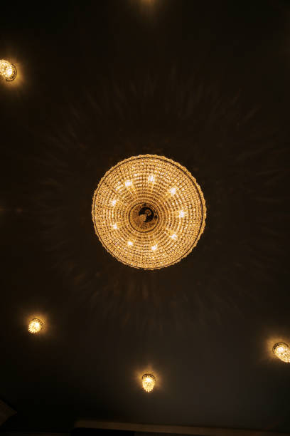 istock Yellow color background with lighting bulb and blank space for text or object. 1181869225