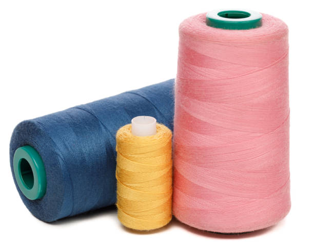 istock Group of spools of color sewing threads isolated on white background 1181869349