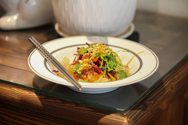 Yusheng, yee sang or yuu sahng, or Prosperity Toss, also known as lo hei is a Cantonese-style raw fish salad. It usually consists of strips of raw fish, mixed with shredded vegetables and a variety of sauces and condiments, among other ingredients. Popularly known in Malaysia and Singapore.