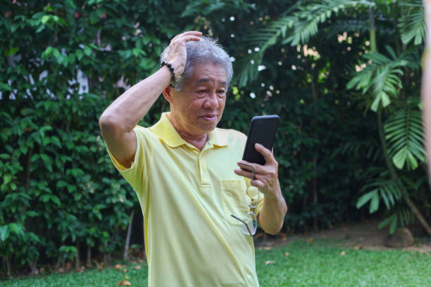 istock A Senior Adult Using a Smart Phone 1181870975