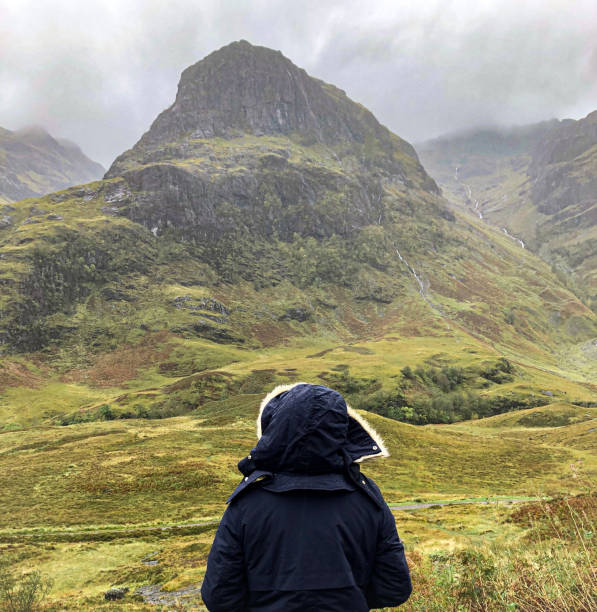 istock Person admiring  Glencoe dramatic scene 1181872317