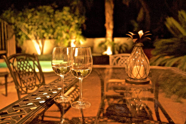 istock Glasses of wine with twilight background 1181872844