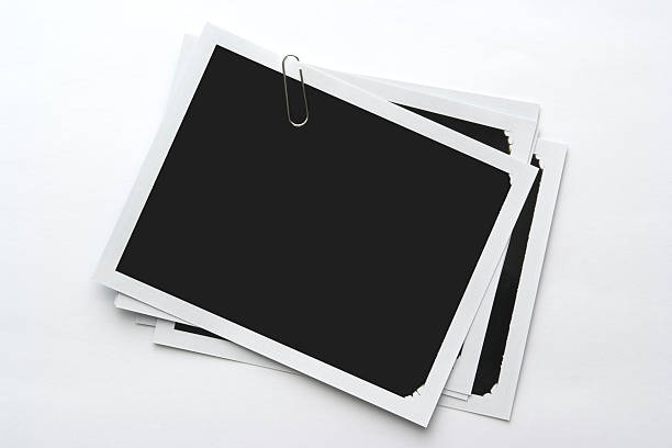 istock Isolated shot of stacked blank Polaroid on white background 118187385