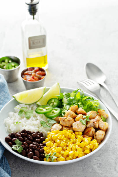 istock Chipotle spicy chicken with rice corn, beans 1181873996