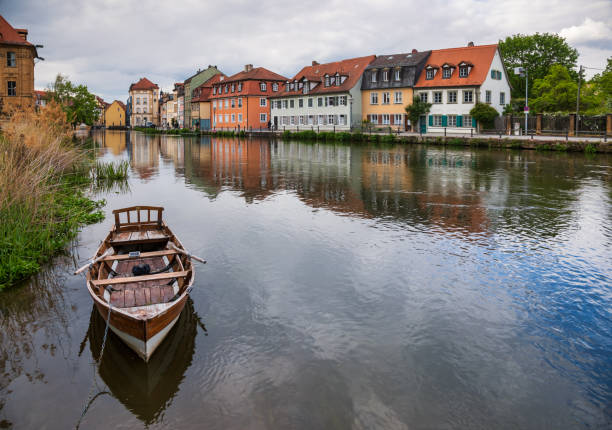Bamberg cityscape with waterfront buildings at the Regnitz river, Bavaria, Germany, Europe. Bamberg is one of most popular travel destinations in Germany. The medieval centre of the city is a UNESCO World Heritage Site.