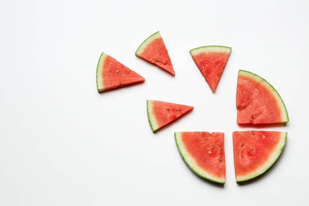 istock Slices of watermelon on a white background. Concept. Who is first. 1181878478