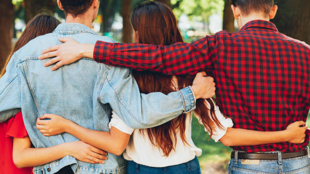 istock polygamy love two men and women embracing 1181879238