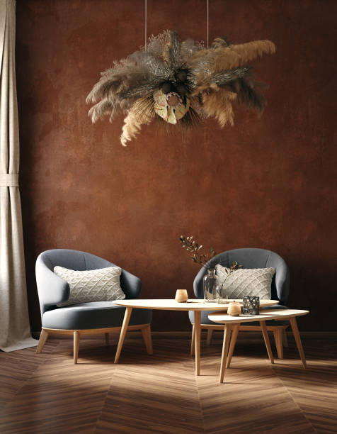 home interior trend, dark room with chairs, coffee table and dry grass bouquet hanging above, living room with old grunge brown wall - fashionable studio shot indoors lifestyles imagens e fotografias de stock