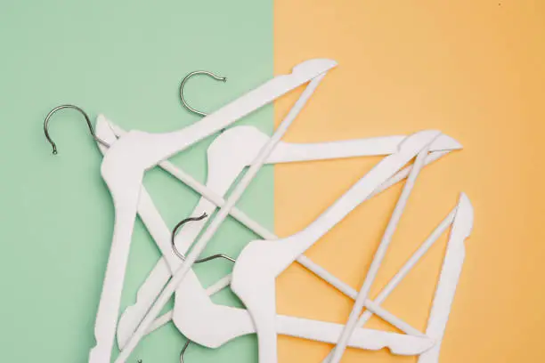 Many hangers / Clothes hanger on a colorfulbackground. sales concept