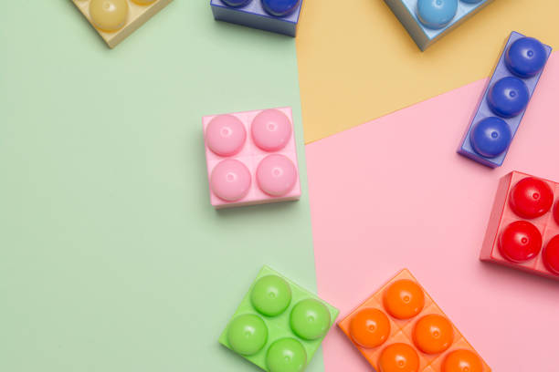 istock Colored toy bricks background. Plastic toy for children. Education concept . 1181886858