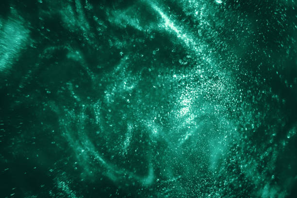 istock mint green festive glitter background 1181887788