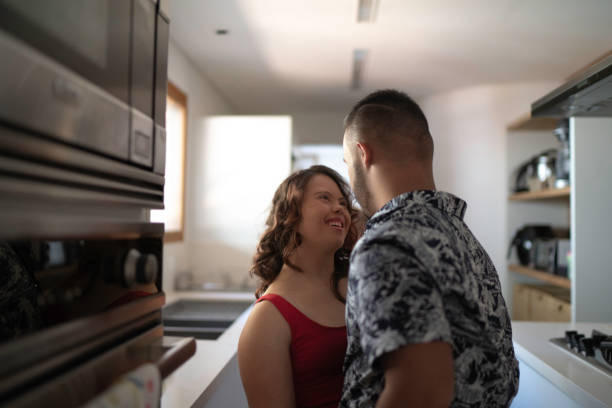 Special needs couple dancing in the kitchen