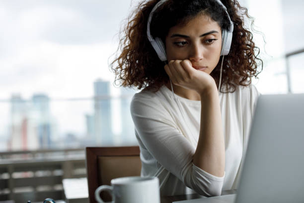 istock Young woman working on laptop 1181893225