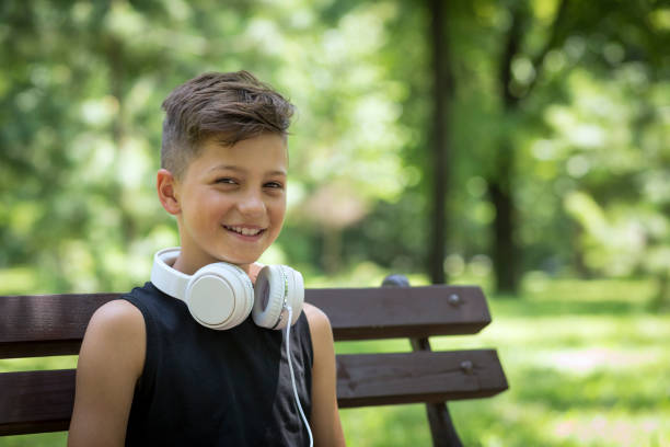 istock Happy boy with headphones 1181894316