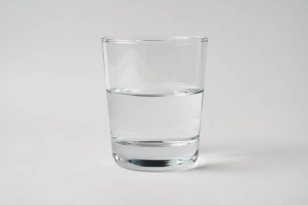 istock Half glass of water 1181894753