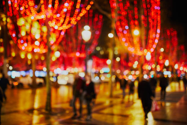Beautiful Christmas illumination on Champs Elysees in Paris, France, abstract blurred view