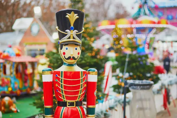 Figurine of wooden hussar on traditional Christmas market in Paris, France