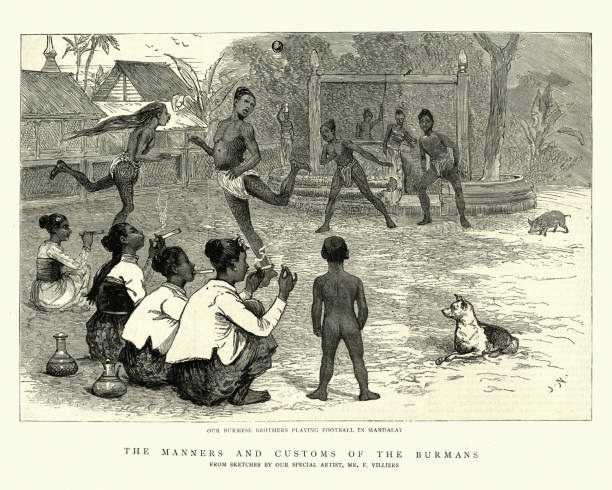 Vintage engraving of Burmese men playing football, while young women watch and smoke cigars, 1886 19th Century