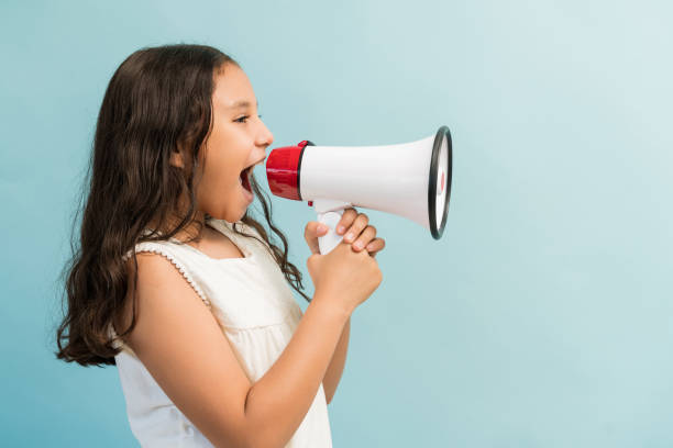 istock Preadolescent Girl Looking Away While Screaming 1181906031