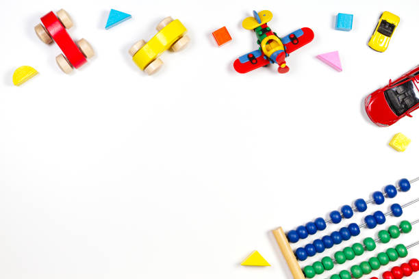 istock Baby kids toys frame on white background. Top view, flat lay. Copy space for text 1181906229