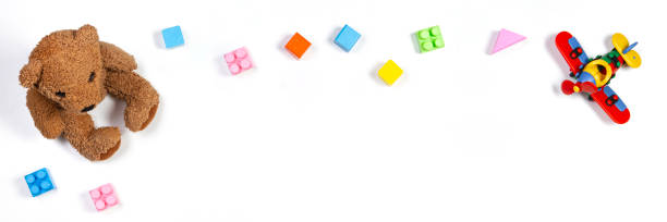 istock Baby kids toys frame on white background. Top view, flat lay. Copy space for text 1181906914