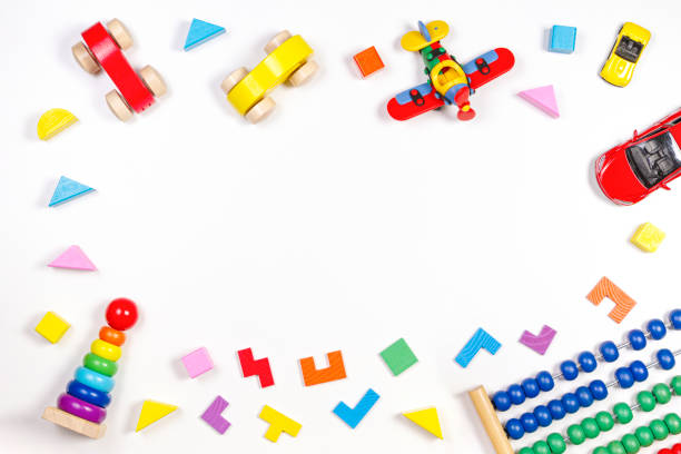 istock Baby kids toys frame on white background. Top view, flat lay. Copy space for text 1181906916