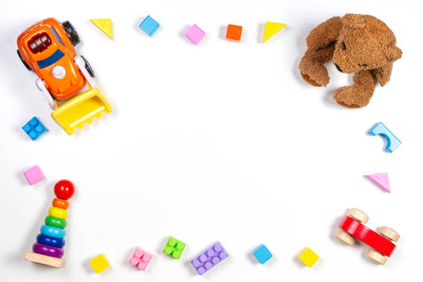 istock Baby kids toys frame on white background. Top view, flat lay. Copy space for text 1181907005