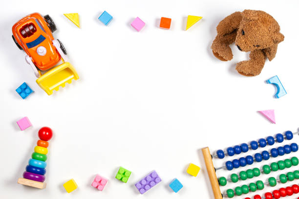 istock Baby kids toys frame on white background. Top view, flat lay. Copy space for text 1181907010