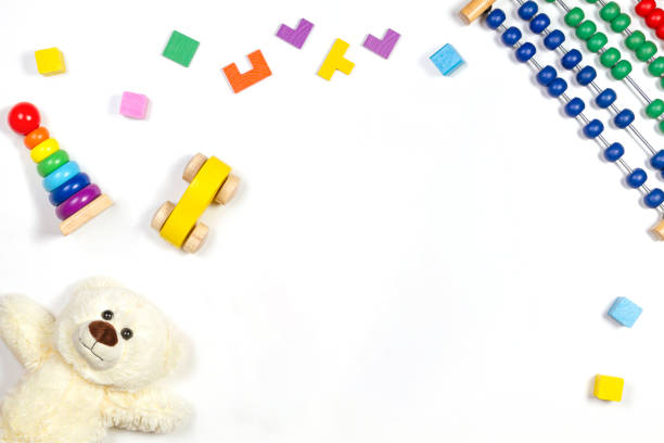 istock Baby kids toys frame on white background. Top view, flat lay. Copy space for text 1181907017