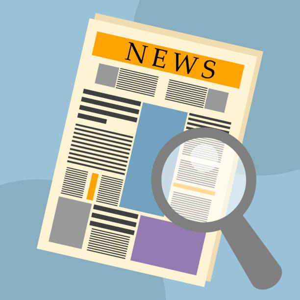 istock News paper with a magnifying glass 1181907233