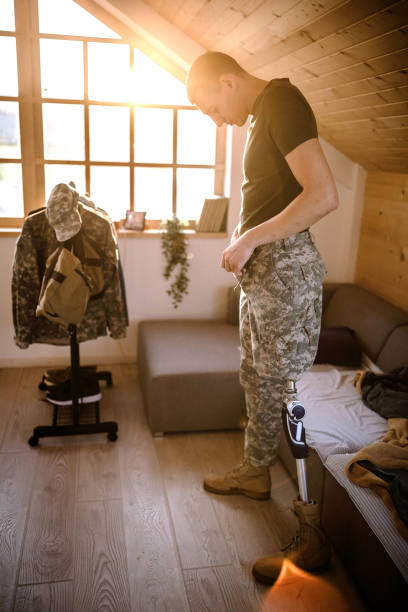 istock Disabled soldier getting ready in the morning 1181907307