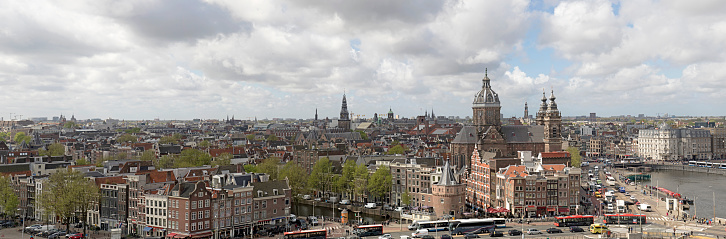 AMSTERDAM , THE NETHERLANDS – APRIL 26 , 2018 :panorama photo of the center of amsterdam. photo taken from the skylounge terrace.