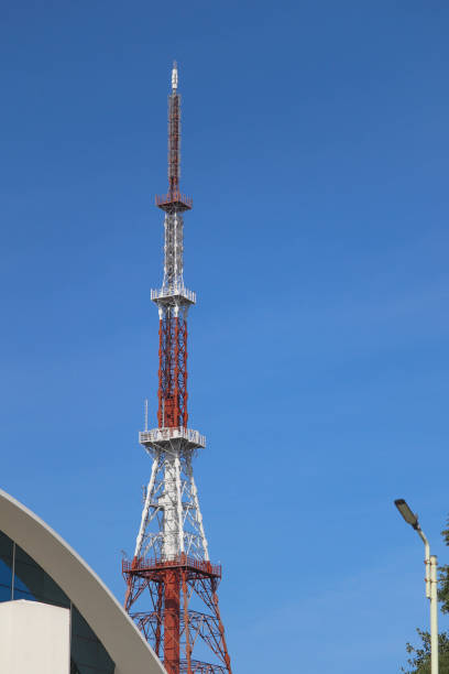 istock Cellular Heavy Duty Transmitter Signal Electric Telephone Transmitter Towers and Blue Sky Standalone 1181910714