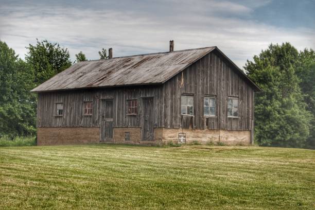 istock 0302 - West Tuscola Road Grey Shack I 1181913220