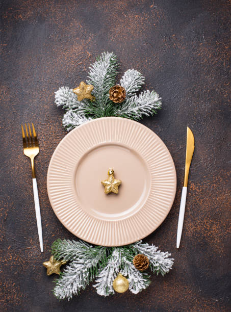 istock Christmas table setting and golden decor 1181913388
