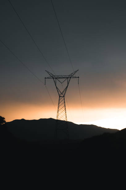 istock Electric tower with a sunset background 1181920942
