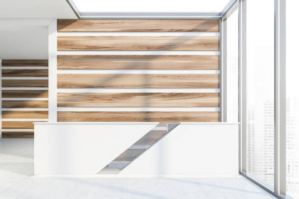 istock Reception in white and wooden office 1181927056