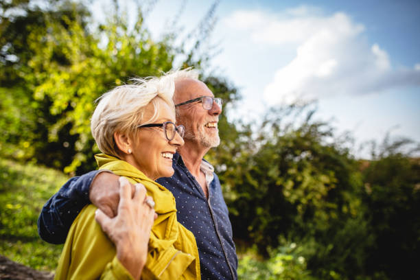 istock Senior couple enjoying in park 1181927100
