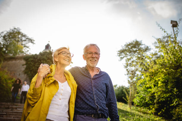 istock Senior couple enjoying in park 1181927102
