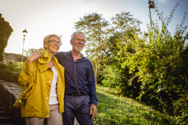 istock Senior couple enjoying in park 1181927807