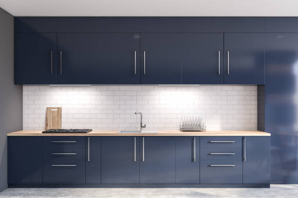 istock Gray and brick kitchen with blue countertops 1181927895