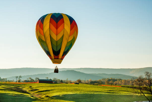 istock Hot Air Balloon Over Farm 1181927991